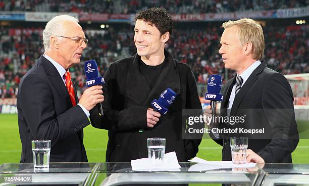 Franz Beckenbauer and Mark van Bommel are interviewed by presenter Johannes B Kerner prior to the UEFA Champions League semi final first leg match...