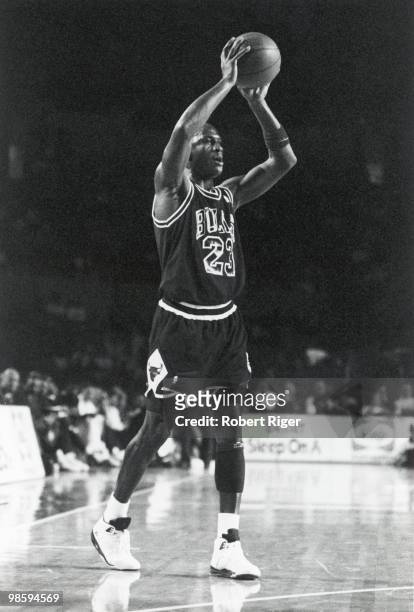 Michael Jordan of the Chicago Bulls looks to pass in an undated photo.