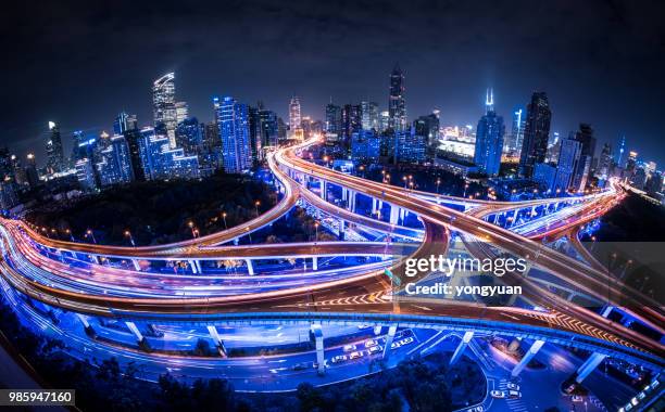 fisheye view of an illuminated road intersection - yongyuan stock pictures, royalty-free photos & images