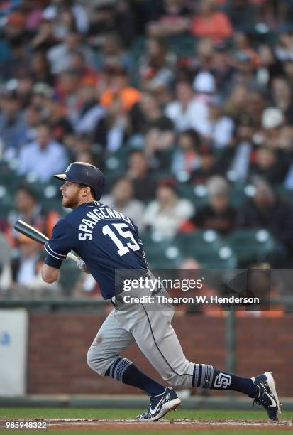 Cory Spangenberg of the San Diego Padres hits a double against the San Francisco Giants in the top of the second inning at AT&T Park on June 22, 2018...