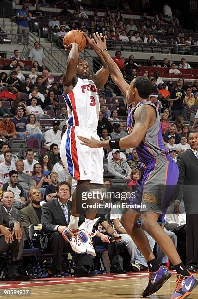 Rodney Stuckey of the Detroit Pistons shoots over Channing Frye of the Phoenix Suns during the game at the Palace of Auburn Hills on April 2, 2010 in...