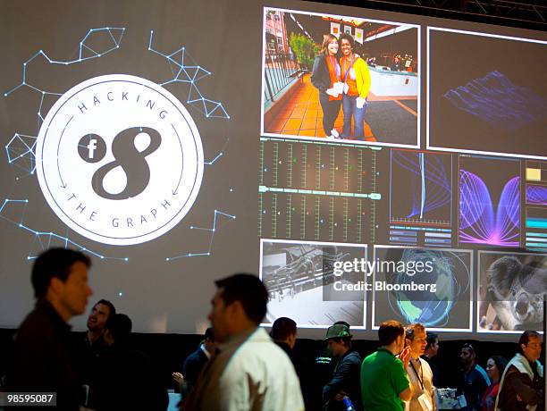Attendees mingle at the Facebook F8 annual developer conference in San Francisco, California, U.S., on Wednesday, April 21, 2010. Facebook Inc. Chief...