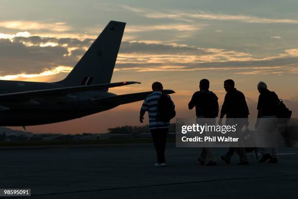 New Zealand war veterans walk across the tarmac at the Penang Airport during a stopover enroute to Gallipoli with the New Zealand Defence Force on...