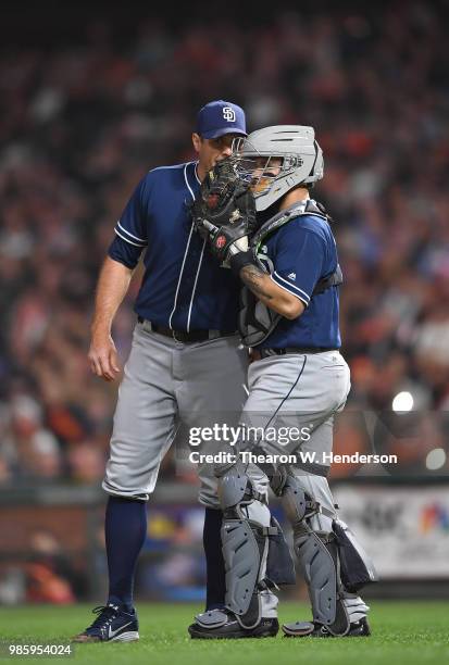 Catcher Raffy Lopez of the San Diego Padres comes out to the mound to have a conversation with pitcher Craig Stammen against the San Francisco Giants...