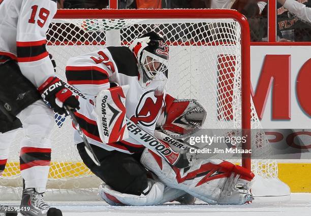Martin Brodeur of the New Jersey Devils makes a save against the Philadelphia Flyers in Game Four of the Eastern Conference Quarterfinals during the...