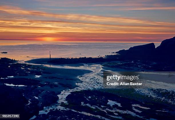 view of estuary in caostal town of combe martin at sunset - ilfracombe stock-fotos und bilder