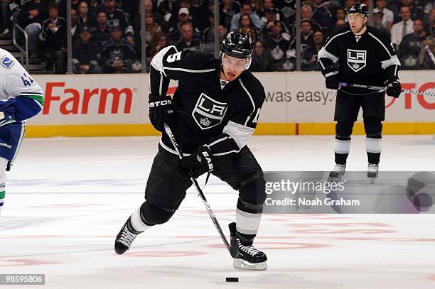 Brad Richardson of the Los Angeles Kings skates with the puck against the Vancouver Canucks in Game Three of the Western Conference Quarterfinals...