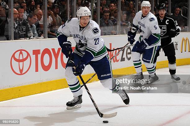 Alexander Edler of the Vancouver Canucks skates with the puck against the Los Angeles Kings in Game Three of the Western Conference Quarterfinals...