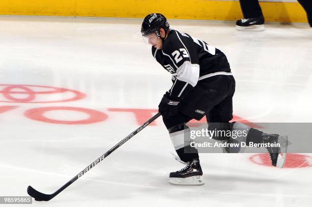 Dustin Brown of the Los Angeles Kings skates with the puck against the Vancouver Canucks in Game Three of the Western Conference Quarterfinals during...