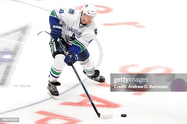 Michael Grabner of the Vancouver Canucks skates with the puck against the Los Angeles Kings in Game Three of the Western Conference Quarterfinals...