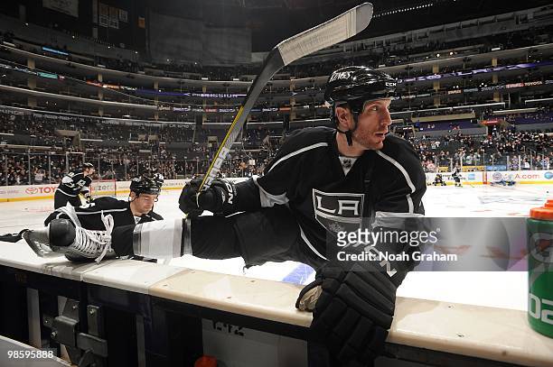 Rob Scuderi of the Los Angeles Kings stretches prior to taking on the Vancouver Canucks in Game Three of the Western Conference Quarterfinals during...