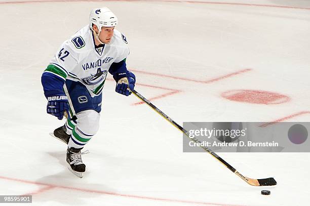 Kyle Wellwood of the Vancouver Canucks skates with the puck against the Los Angeles Kings in Game Three of the Western Conference Quarterfinals...