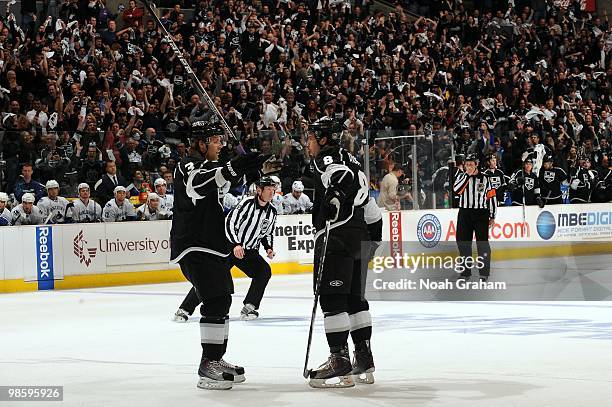 Jack Johnson and Drew Doughty of the Los Angeles Kings react after a goal against the Vancouver Canucks in Game Three of the Western Conference...