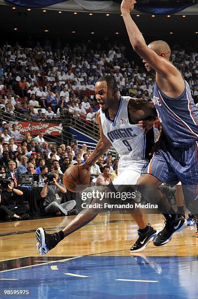 Rashard Lewis of the Orlando Magic drives to the basket against Boris Diaw of the Charlotte Bobcats in Game One of the Eastern Conference...