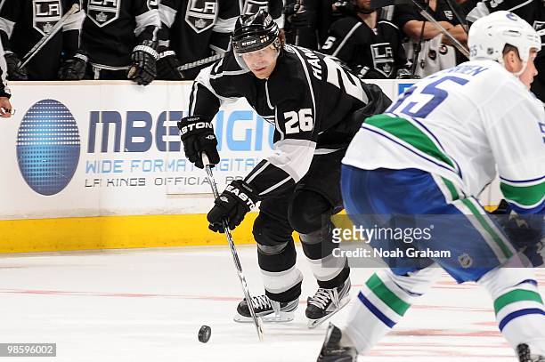 Michal Handzus of the Los Angeles Kings skates with the puck against the Vancouver Canucks in Game Three of the Western Conference Quarterfinals...