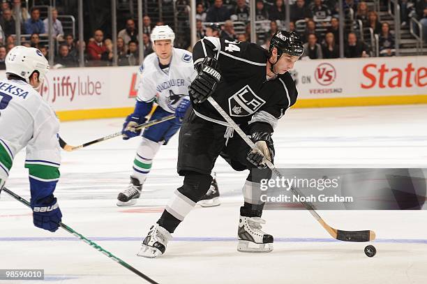 Ryan Smyth of the Los Angeles Kings skates with the puck against the Vancouver Canucks in Game Three of the Western Conference Quarterfinals during...