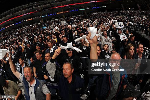 Kings fans celebrate after a goal by the Los Angeles Kings against the Vancouver Canucks in Game Three of the Western Conference Quarterfinals during...