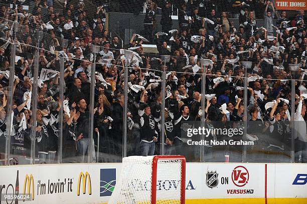 Kings fans celebrate after a goal by the Los Angeles Kings against the Vancouver Canucks in Game Three of the Western Conference Quarterfinals during...