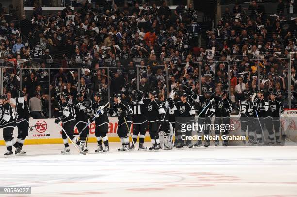 The Los Angeles Kings celebrate after defeating the Vancouver Canucks in Game Three of the Western Conference Quarterfinals during the 2010 NHL...