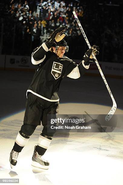 Jack Johnson of the Los Angeles Kings waves to the crowd after defeating the Vancouver Canucks in Game Three of the Western Conference Quarterfinals...