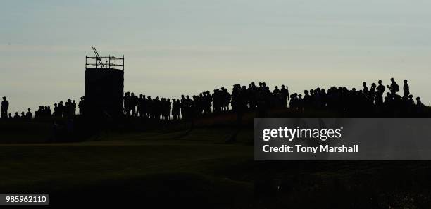 Spectators watch the action on the 10th green during Day One of the HNA Open de France at Le Golf National on June 28, 2018 in Paris, France.