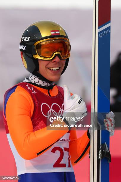 Franz-Josef Rehrl from Austria celebrating after his jump during the Nordic combined event in the Alpensia Ski Jump Centre in Pyeongchang, South...