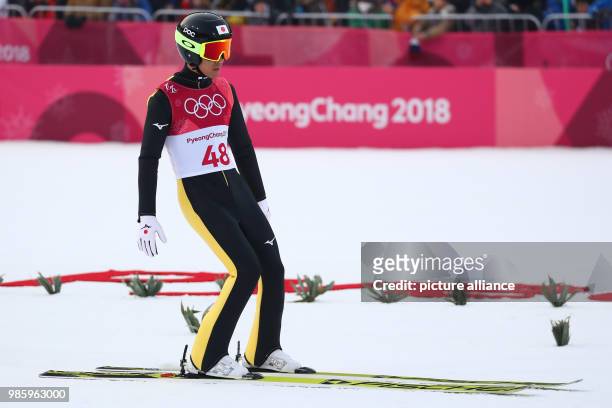 Akito Watabe from Japan after his jump during the Nordic combined event in the Alpensia Ski Jump Centre in Pyeongchang, South Korea, 14 February...