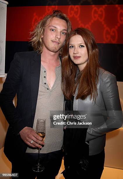 Jamie Campbell Bower and Bonnie Wright attend the Gucci Icon Temporary store opening on April 21, 2010 in London, England.