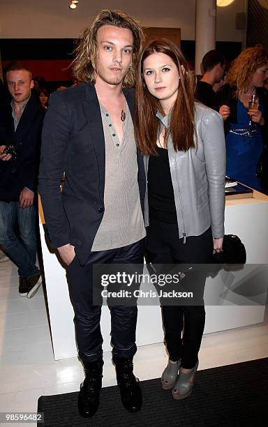 Jamie Campbell Bower and Bonnie Wright attend the Gucci Icon Temporary store opening on April 21, 2010 in London, England.