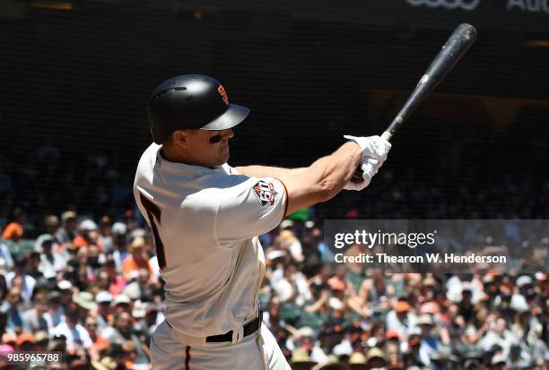 Nick Hundley of the San Francisco Giants bats against the San Francisco Giants in the bottom of the second inning at AT&T Park on June 23, 2018 in...