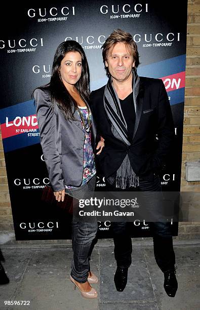 Roger Taylor and his wife attend the Gucci Icon Temporary store opening on April 21, 2010 in London, England.