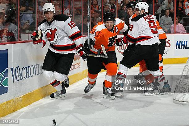 Travis Zajac of the New Jersey Devils skates against Kimmo Timonen of the Philadelphia Flyers in Game Four of the Eastern Conference Quarterfinals...