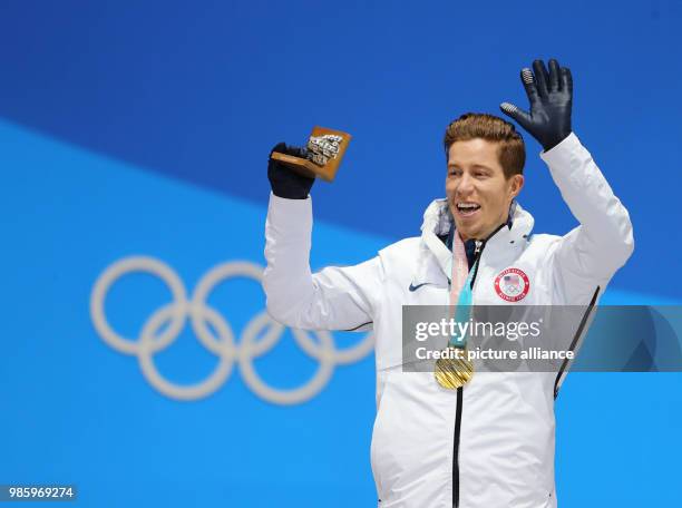 Shaun White from the US celebrating his gold medal during the award ceremony of the men's halfpipe snowboard event in Pyeongchang, South Kora, 14...
