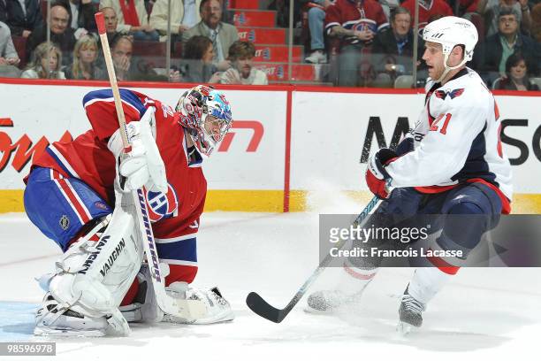 Brooks Laich of the Washington Capitals takes a shot on goalie Carey Price of the Montreal Canadiens in Game Four of the Eastern Conference...