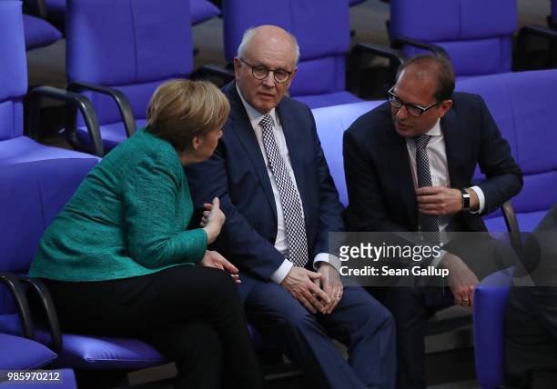 German Chancellor and leader of the German Christian Democrats Angela Merkel speaks with CDU Bundestag faction leader Volker Kauder and Bavarian...