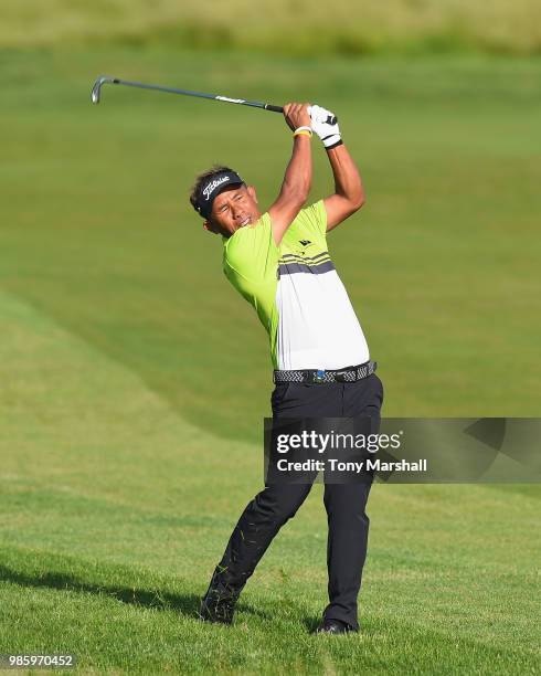 Thongchai Jaidee of Thailand plays his second shot on the 10th fairway during Day One of the HNA Open de France at Le Golf National on June 28, 2018...