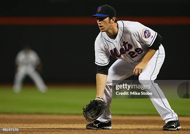 Ike Davis of the New York Mets gets ready to play the field against the Chicago Cubs on April 21, 2010 at Citi Field in the Flushing neighborhood of...