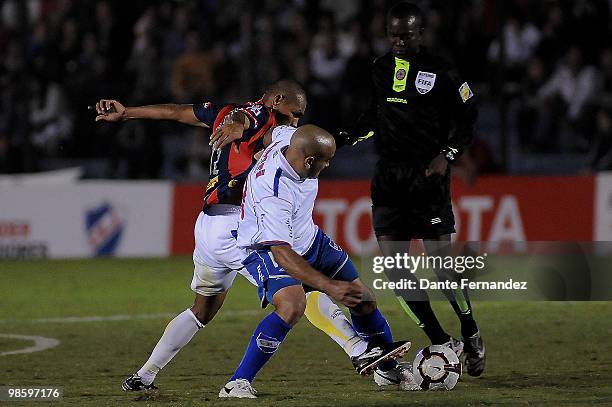 Raul Ferro of Uruguay's Nacional vies for the ball during their match as part of the Santander Libertadores Cup 2010 at the Central Park Stadium on...