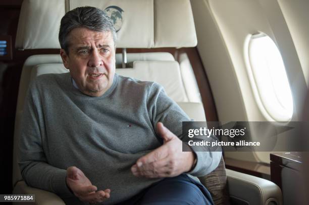 German Foreign Minister Sigmar Gabriel speaking to the press aboard a German Air Force Airbus A319 in Berlin, Germany, 14 February 2018. Gabriel is...