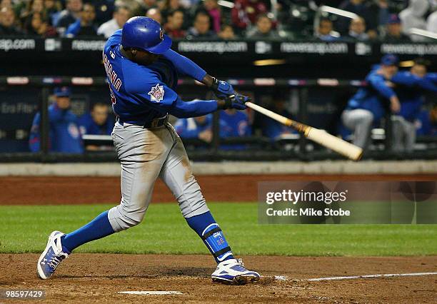 Alfonso Soriano of the Chicago Cubs follows through on a seventh-inning home run against the New York Mets on April 21, 2010 at Citi Field in the...