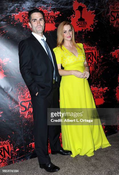 Sam Witwer and Annie Wersching pose in the press room at the Academy Of Science Fiction, Fantasy & Horror Films' 44th Annual Saturn Awards at The...