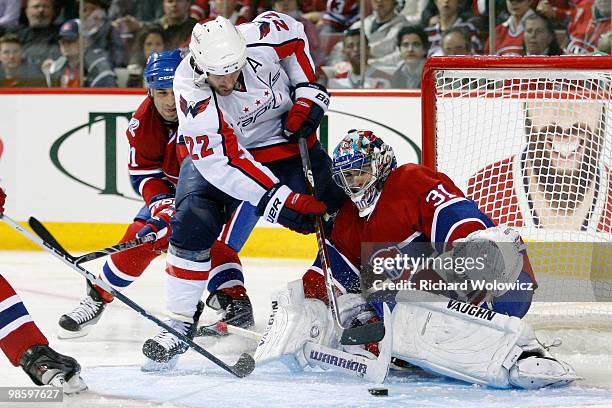 Mike Knuble of the Washington Capitals shoots the puck on Carey Price of the Montreal Canadiens in Game Four of the Eastern Conference Quarterfinals...