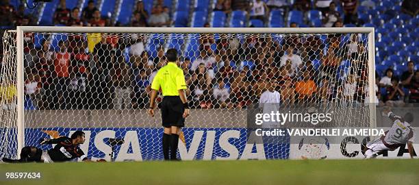 Caracas' Garcia Castelo celebrates after scoring against Brazil's Flamengo during their Libertadores Cup football match at Maracana stadium in Rio de...