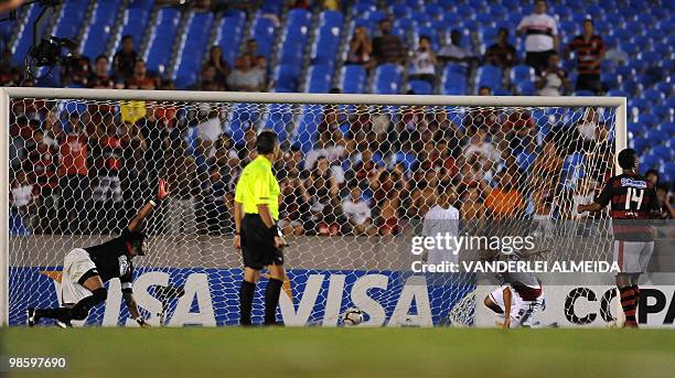 Caracas' Garcia Castelo celebrates after scoring against Flamengo during their Libertadores Cup football match at Maracana stadium in Rio de Janeiro,...