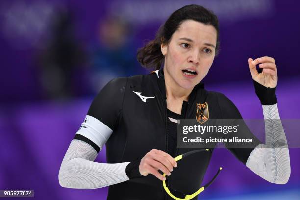 Germany's Gabriele Hirschbichler reacts after the women's 1000m speed skating event on day five of the Pyeongchang 2018 Winter Olympic Games at the...