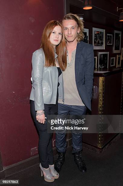 Bonnie Wright and Jamie Bower attend the afterparty following the opening of Gucci's pop-up sneaker store, at Ronnie Scott's on April 21, 2010 in...