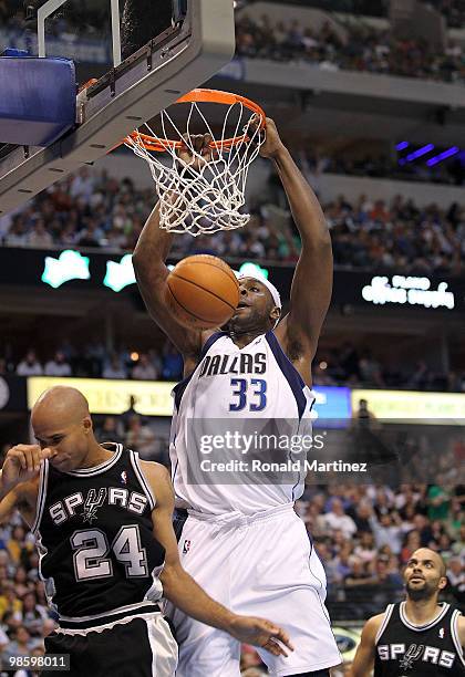 Center Brendan Haywood fo the Dallas Mavericks makes the slam dunk in front of Richard Jefferson of the San Antonio Spurs in Game Two of the Western...