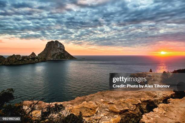 es vedra island at sunset. ibiza island, balearic islands. spain - beach at cala d'or stock pictures, royalty-free photos & images