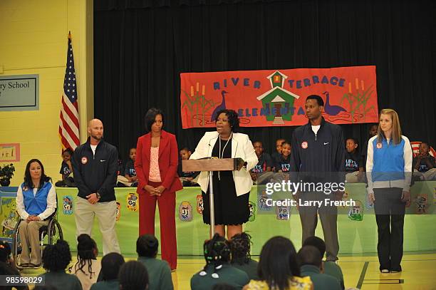 Members of the Vancouver 2010 United States Olympic and Paralympic teams Alana Nichols, Heath Calhoun, first lady Michelle Obama, Principal Shannon...