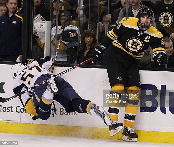 Zdeno Chara of the Boston Bruins shoves Tyler Myers of the Buffalo Sabres in Game Four of the Eastern Conference Quarterfinals during the 2010 NHL...